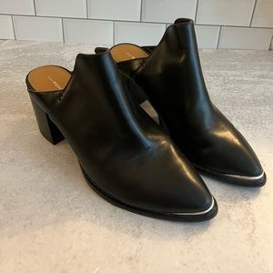 Report heeled mules